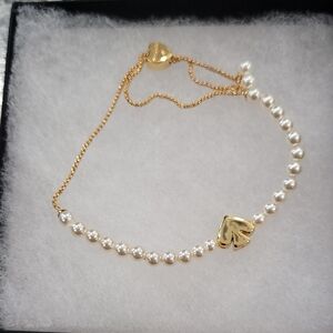 Kate Spade Elegant Gold and Pearl Bracelet
